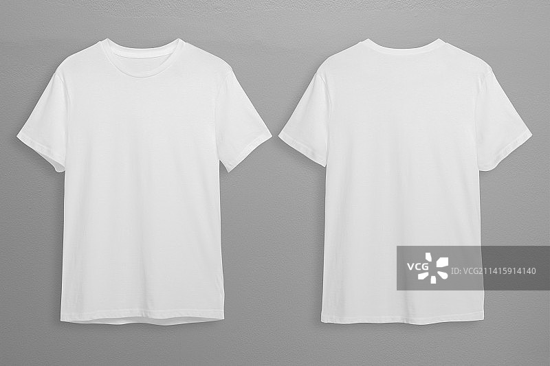 灰色背景上悬挂的衣服特写图片素材