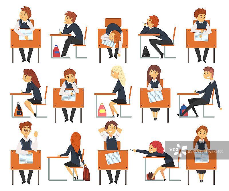 男孩和女孩在课桌旁学习图片素材