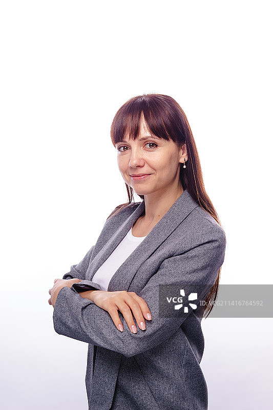 白底灰西装的棕发女人商务照图片素材