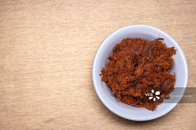 餐桌碗中辣椒片俯视图，印度尼西亚图片素材