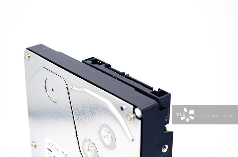 中国电脑电子产品设备用品影棚拍摄拍摄主题，一个传统3.5英寸机械硬盘特写，室内无人图像摄影图片素材