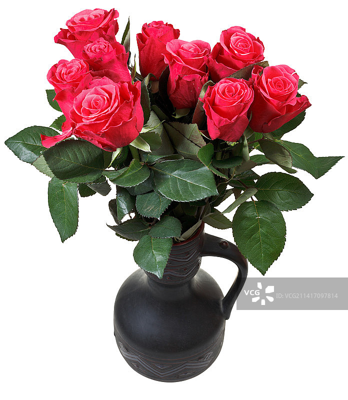 黑色陶瓷罐中的红色玫瑰花束图片素材