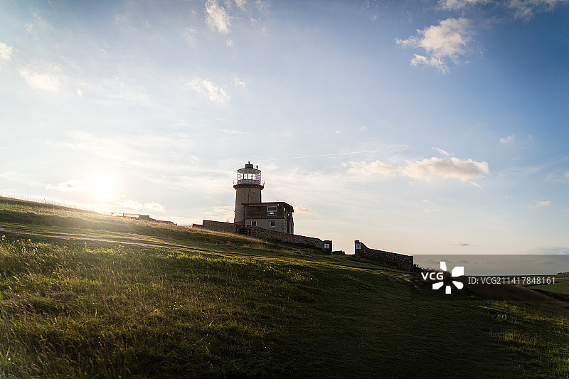 英国布莱顿白崖与灯塔 日落时分图片素材