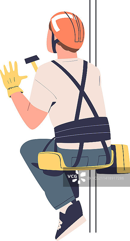 在高处用锤子悬挂工作的男人图片素材