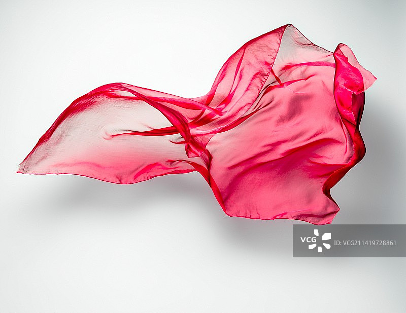 红色抽象飞舞织物，巴基斯坦图片素材