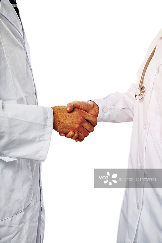 医生和病人握手的腰部特写图片素材