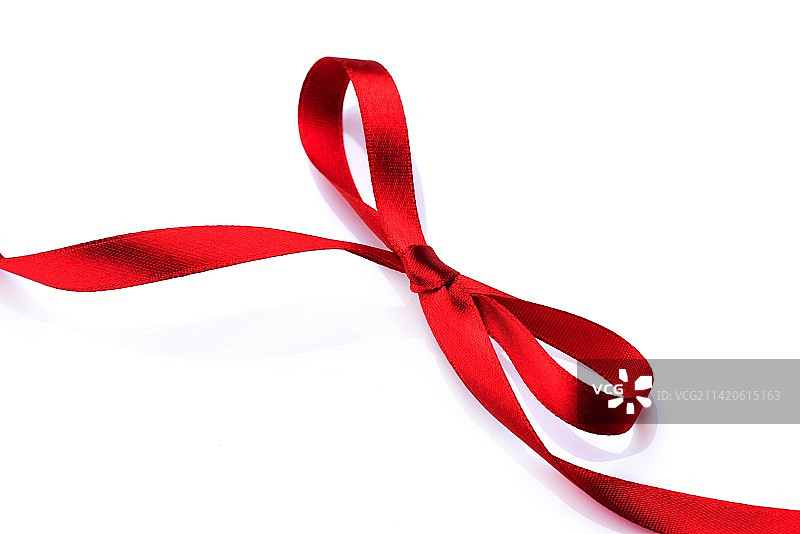 红色缎面礼品蝴蝶结红色丝绸缎带图片素材