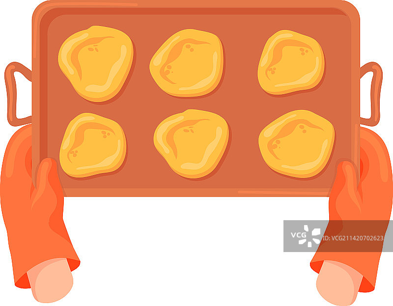 烤箱手套手持装有生曲奇的烤盘图片素材