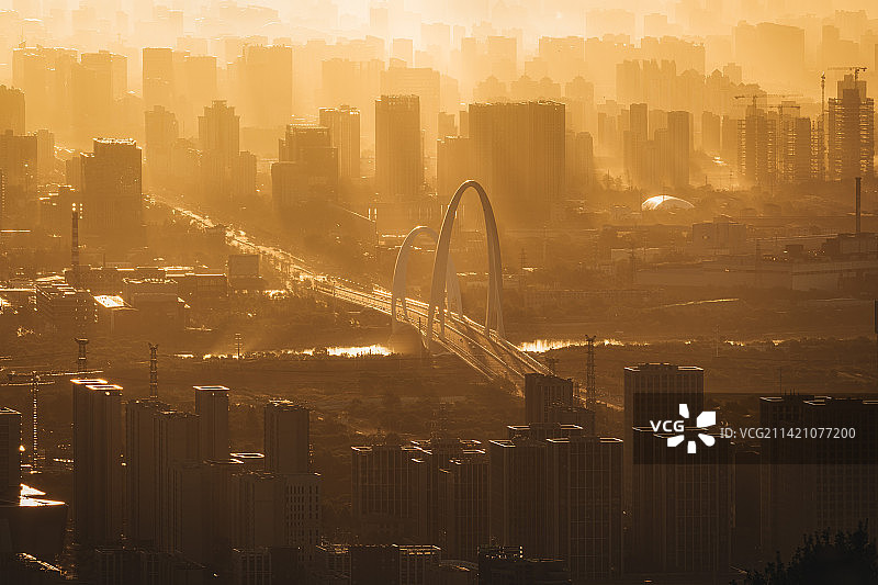 朝阳下的长安街新首钢大桥北京天际线图片素材