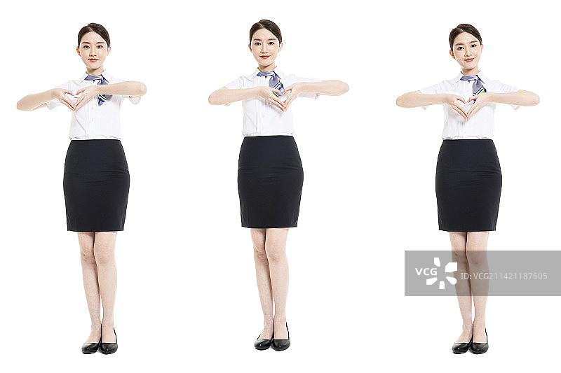 年轻的商务女士身着白色短袖衬衫图片素材