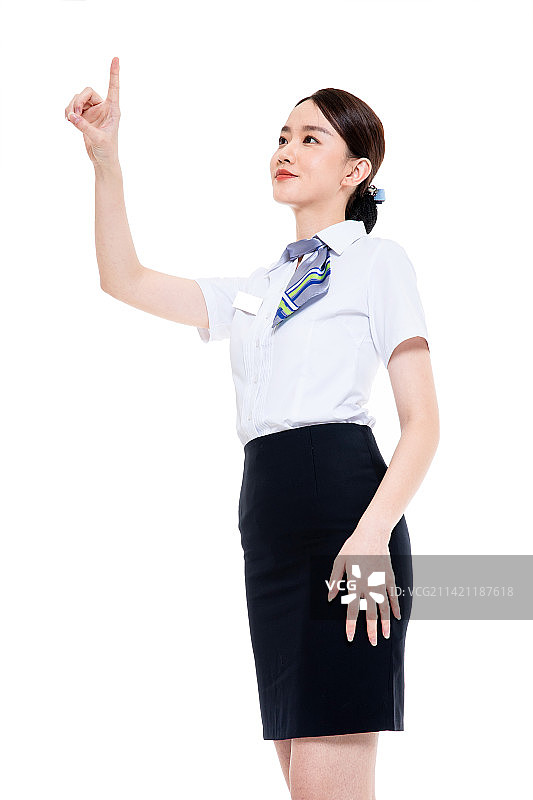 年轻的商务女士身着白色短袖衬衫图片素材