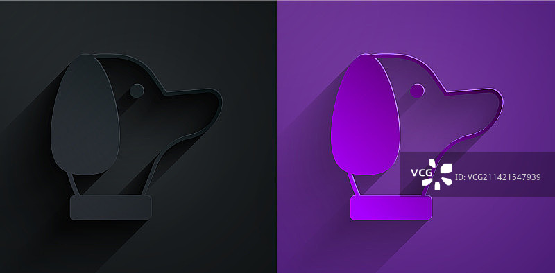 紫黑色背景上的小狗剪纸图标图片素材