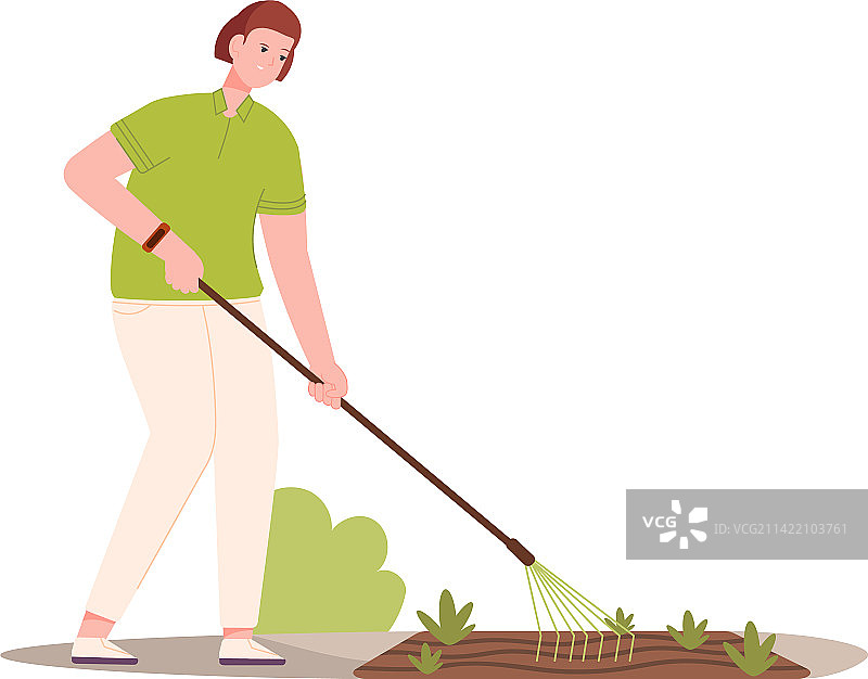 用耙子进行生态耕作的女农民图片素材