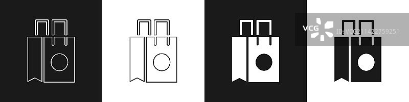 黑色背景上的纸质购物袋图标图片素材