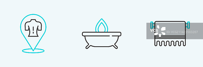 挂在衣架上的毛巾、按摩香薰蜡烛图片素材