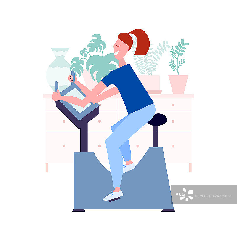 在健身自行车上的女人图片素材