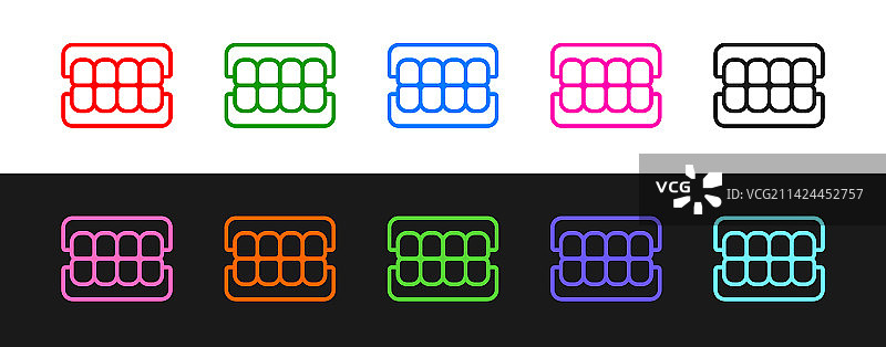 黑色背景上的假牙图标图片素材