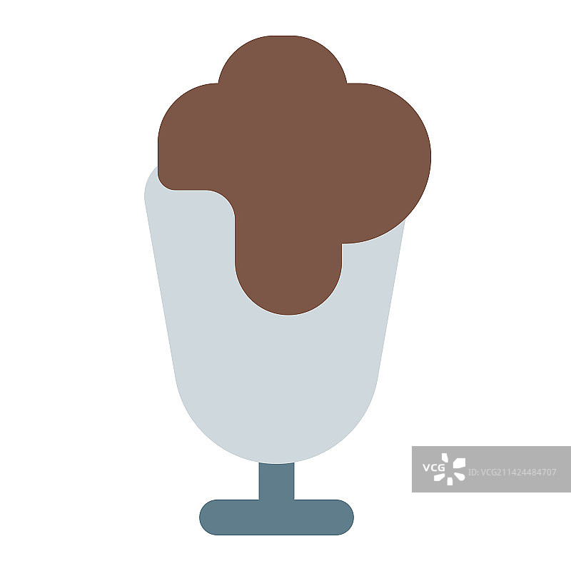 美味奶昔上滴落的融化奶油图片素材