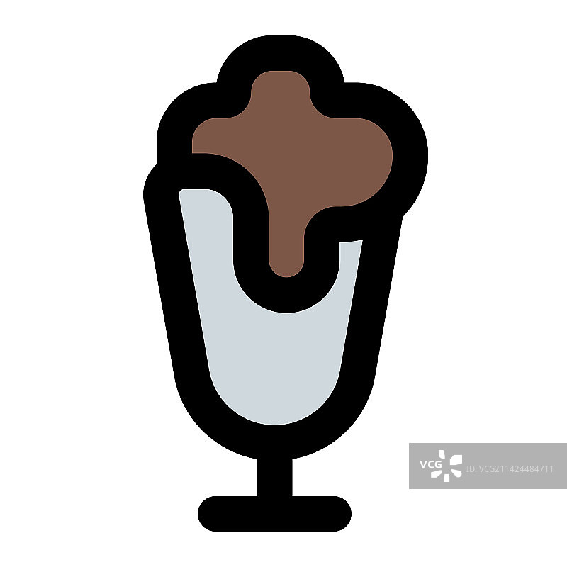 美味奶昔上滴落的融化奶油图片素材