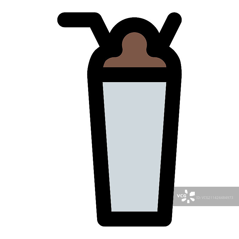 玻璃杯中盛放的冰爽奶昔图片素材