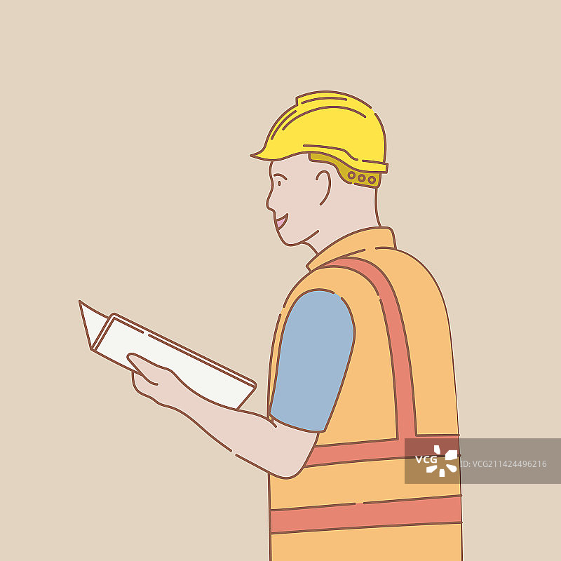 身穿制服头戴黄色头盔的工程师正在阅读图片素材