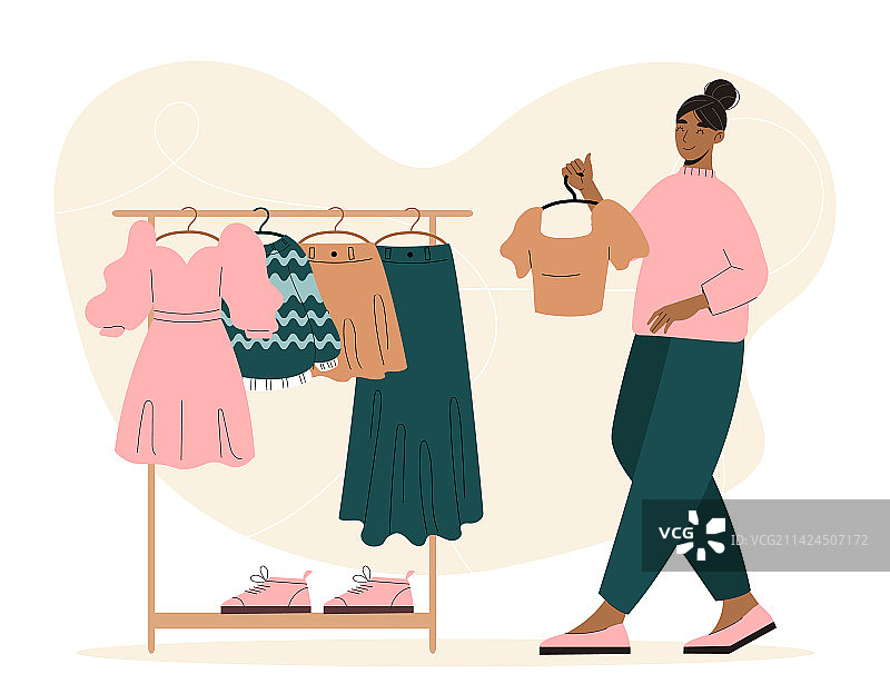 女人选择衣服图片素材