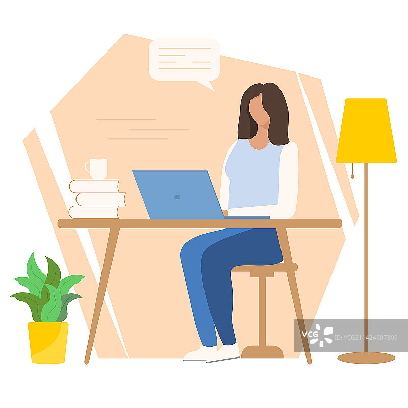 女商人坐在桌旁使用笔记本电脑图片素材
