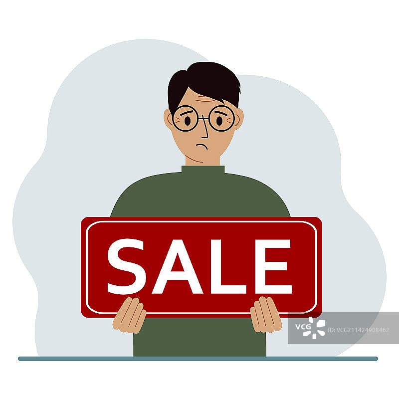 男人举着写有“促销”字样的大标志牌图片素材