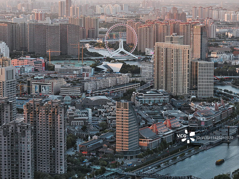 夕阳下的天津市天津之眼摩天轮图片素材