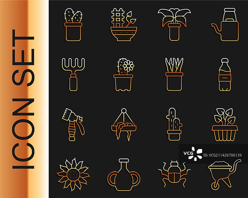 装满泥土的独轮车和室内常春藤图片素材