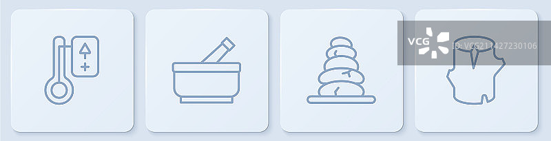 桑拿温度计与热石堆图片素材