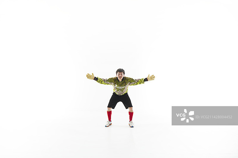 伸出双手的守门员图片素材