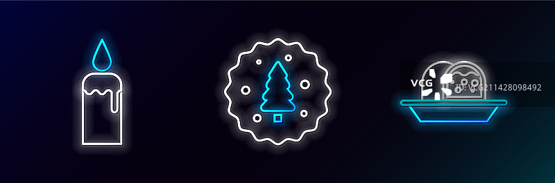 杏仁蛋白软糖、海绵蛋糕与燃烧的蜡烛图片素材