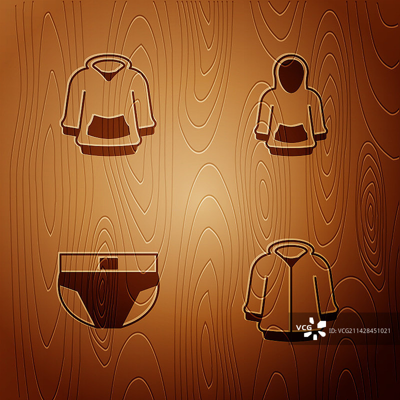 木制背景上的男士连帽衫和内裤套装图片素材