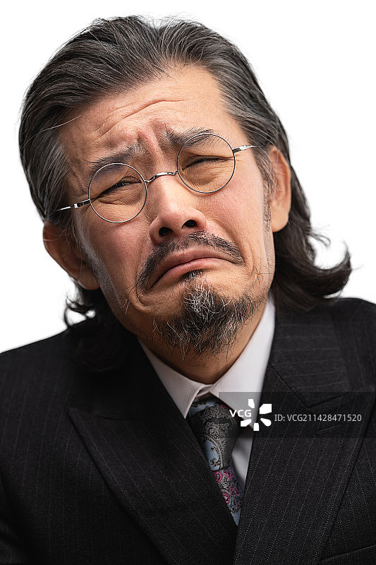 面露难色的商务中老年男人图片素材