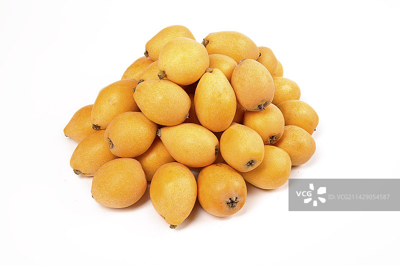 白底上放着一堆米易甜枇杷图片素材