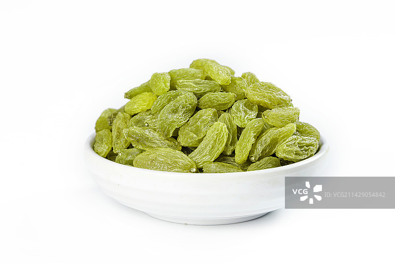 白底上放着一碗绿葡萄干图片素材
