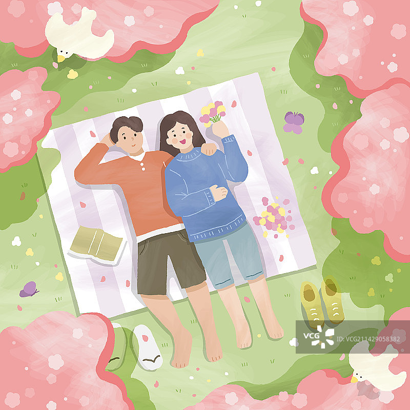 樱花季可爱情侣仰卧野餐垫上约会赏樱图片素材