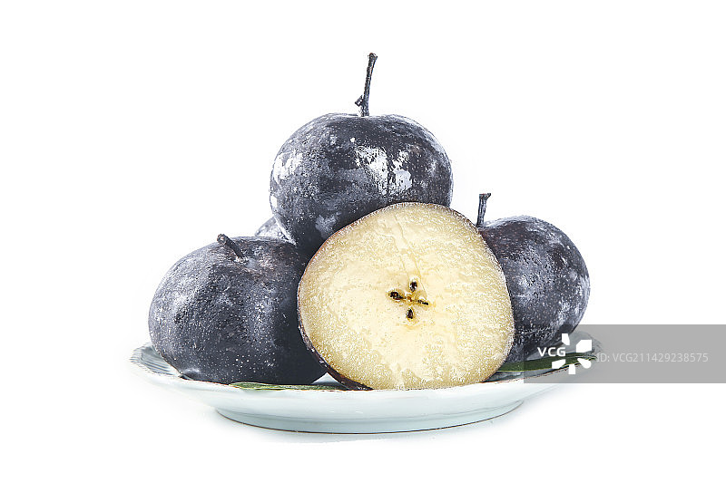 白底上放着一盘冻梨图片素材