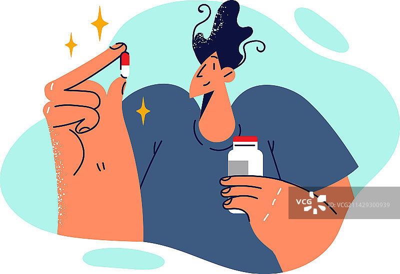 年轻男人检查胶囊，手拿罐子图片素材