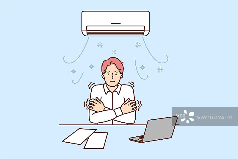 男人坐在空调下的办公桌旁图片素材