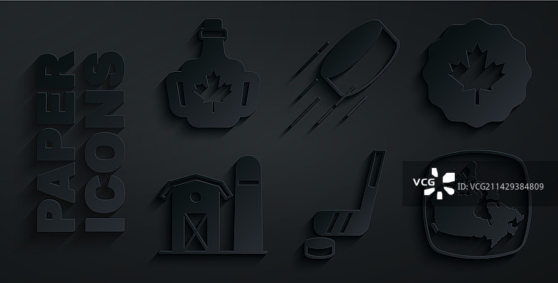 冰球球杆和冰球加拿大枫叶图片素材