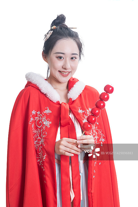 穿着古装汉服拿着冰糖葫芦的亚洲美女肖像图片素材