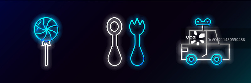 玩具车、棒棒糖和婴儿餐具套装图片素材