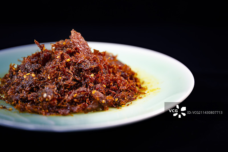 静物摄影麻辣牛肉丝灯影牛肉丝图片素材