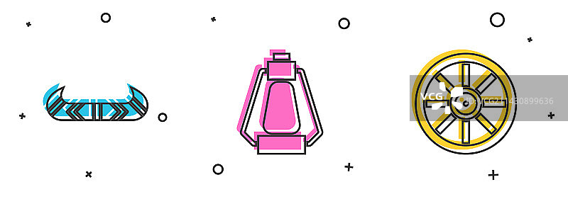 皮划艇或独木舟、桨和露营灯图片素材