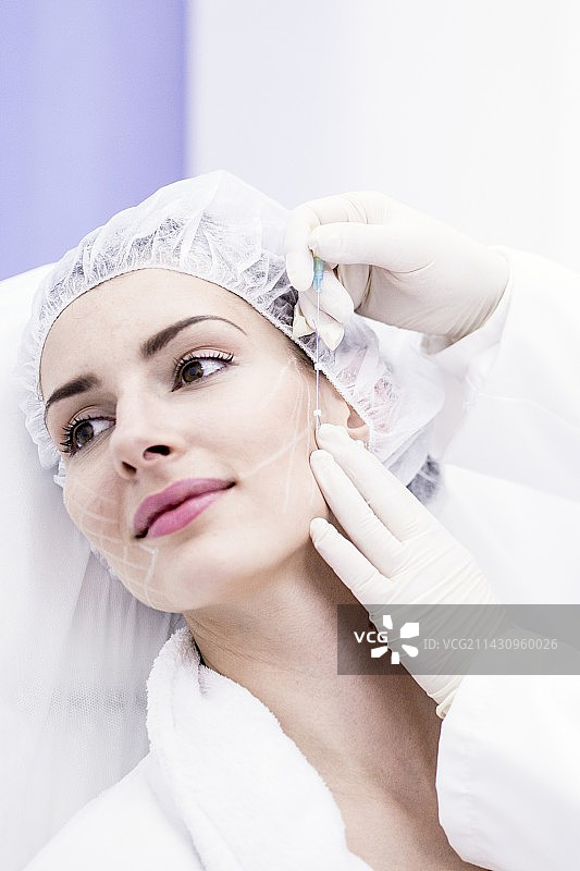 皮肤科医生使用线 applicator图片素材