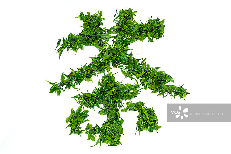 用新鲜茶叶摆放的茶字图片素材