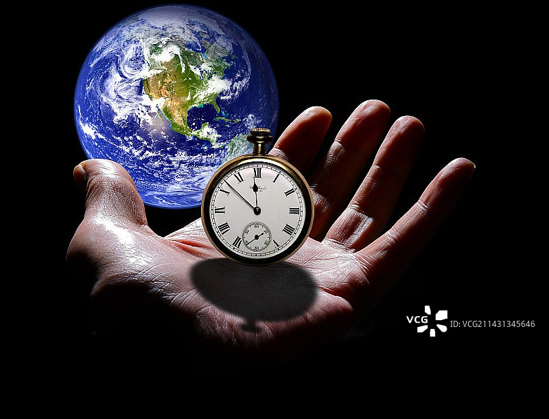 手握秒表的地球图片素材