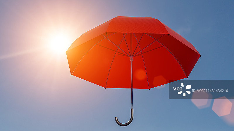 猛烈的阳光照射着红色的雨伞图片素材